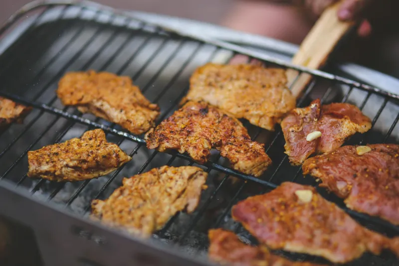 How Housing Shortages and Suburban Lawns Accidentally Created America's Grill Obsession